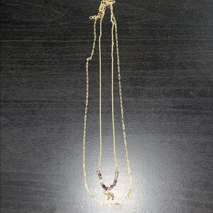 Elegant Gold Necklace with Purple Accents